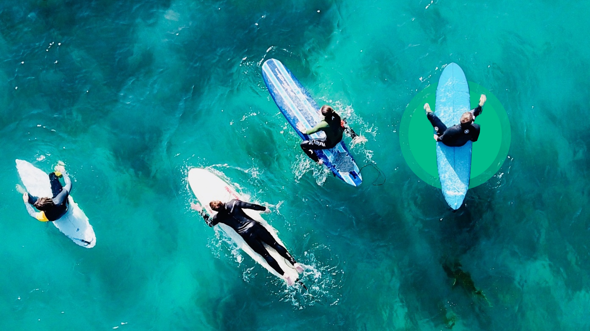 Surfers On Surf Boards In Ocean
